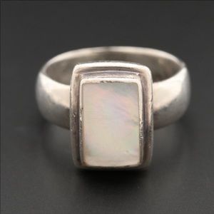 Sue Huston mother of pearl sterling ring. 6.75.